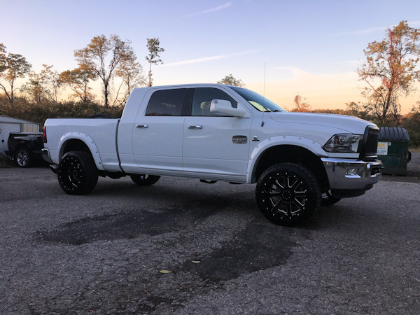 Ram 2500with 22x12 Gear Alloy Big Block wheels and 33 inch Toyo Open Country AT2 tires 