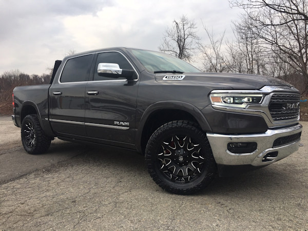 2019 Ram 1500 with 20x9 Fuel Offroad Battleaxe wheels and 33 inch Nitto Ridge Grappler tires 