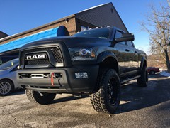 2017 Ram Power Wagon 2500 with a Truxxx leveling kit and 20x10 Sota Novakane wheels and 35inch Nitto Terra Grappler G2 tires