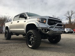 2017 Toyota Tundra with 6 inch Rough Country lift kit and 22 inch Moto Metal Link wheels and 37 inch Nitto Trail Grappler tires.  Fab Fours front and rear bumpers with Rigid Industries LED lighting and Magnuson Supercharger with Corsa exhaust