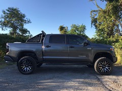 2018 Tundra TRD, 6in. Rough Country Lift powder coated Red, 22x10 Dropstar 654MB’s,35x12.50x22 Radar R7 M/T’s, Go Rihno Roll Bar