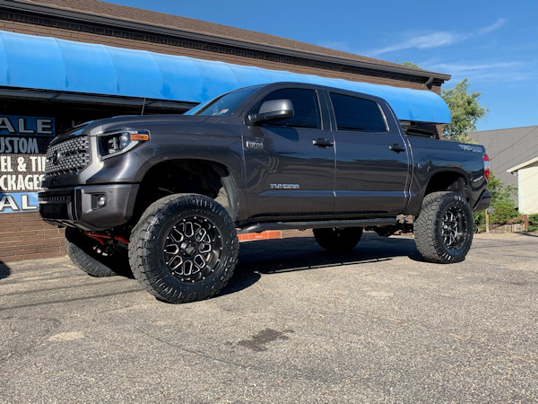 2019 Toyota Tundra with 8 inch Readylift lift kit and 20x10 XD820 wheels with 37 inch Nitto Ridge Grappler tires 