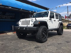 2016 Jeep Wrangler with 3 inch Zone Offroad lift kit and 20x9 Moto Metal MO962 wheels with 35 in Mastercraft MXT tires