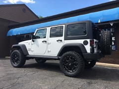 2016 Jeep Wrangler with 3 inch Zone Offroad lift kit and 20x9 Moto Metal MO962 wheels with 35 in Mastercraft MXT tires